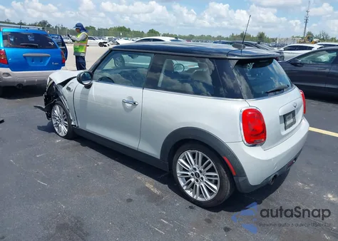 2014 Mini Cooper Cooper from USA, damaged, VIN WMWXM5C56ET933833